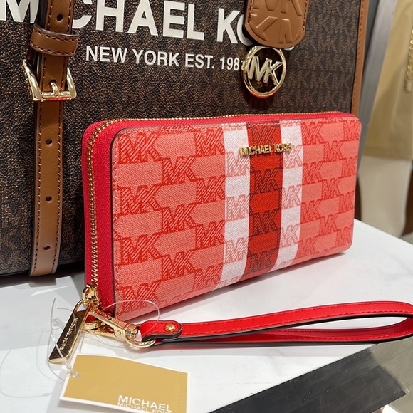 MICHAEL KORS Leather Continental Phone Holder Wristlet Wallet 
Dark Sungria
NWT